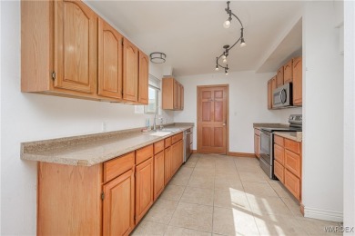 This cozy 3 bedroom, 2 bathroom residence offers a welcoming on Chaparral Golf and Country Club in Arizona - for sale on GolfHomes.com, golf home, golf lot