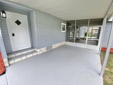 Remodeled Double-Wide manufactured home located in one of the on Barefoot Bay Golf Course in Florida - for sale on GolfHomes.com, golf home, golf lot