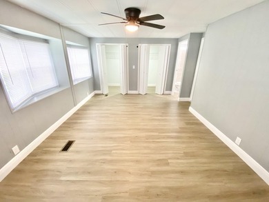 Remodeled Double-Wide manufactured home located in one of the on Barefoot Bay Golf Course in Florida - for sale on GolfHomes.com, golf home, golf lot