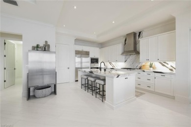 Discover the epitome of luxury living in this beautifully on Miromar Lakes Golf Club in Florida - for sale on GolfHomes.com, golf home, golf lot