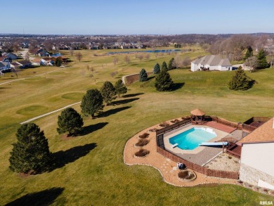 Located on a sprawling 2.3-acre lot, this 4-bedroom, 3-full on Springbrook Country Club in Iowa - for sale on GolfHomes.com, golf home, golf lot