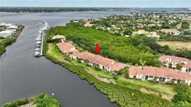 Enjoy serene waterfront views and beautiful sunsets from this on Palm Cove Golf and Yacht Club in Florida - for sale on GolfHomes.com, golf home, golf lot
