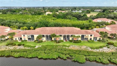 Enjoy serene waterfront views and beautiful sunsets from this on Palm Cove Golf and Yacht Club in Florida - for sale on GolfHomes.com, golf home, golf lot
