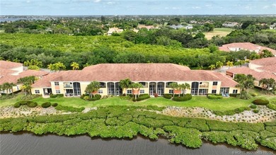 BRAND NEW ROOF!! Enjoy serene waterfront views and beautiful on Palm Cove Golf and Yacht Club in Florida - for sale on GolfHomes.com, golf home, golf lot