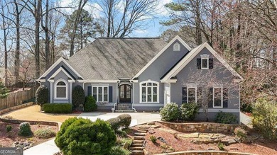 Welcome to 5619 Forkwood Dr- a beautiful and rare ranch home in on Brookstone Golf and Country Club in Georgia - for sale on GolfHomes.com, golf home, golf lot