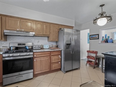 Exceptional opportunity in Douglaston! This spacious two-family on Douglaston Park Golf Course in New York - for sale on GolfHomes.com, golf home, golf lot