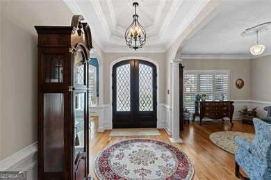 Welcome to 5619 Forkwood Dr- a beautiful and rare ranch home in on Brookstone Golf and Country Club in Georgia - for sale on GolfHomes.com, golf home, golf lot