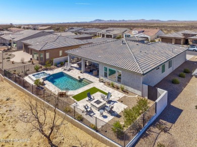 A Highly Upgraded 2466 Sq. Ft. Vienta Exterior Design A Pool on Saddlebrooke Ranch Golf Club in Arizona - for sale on GolfHomes.com, golf home, golf lot