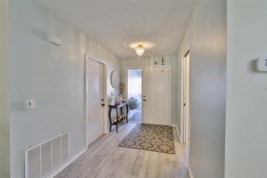 MOVE-IN READY and beautifully updated 2 bedroom, 2 bath expanded on Falcon Watch Golf Club in Florida - for sale on GolfHomes.com, golf home, golf lot