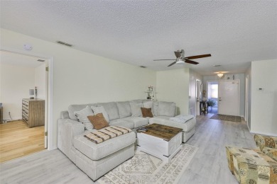 MOVE-IN READY and beautifully updated 2 bedroom, 2 bath expanded on Falcon Watch Golf Club in Florida - for sale on GolfHomes.com, golf home, golf lot
