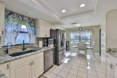 MOVE-IN READY and beautifully updated 2 bedroom, 2 bath expanded on Falcon Watch Golf Club in Florida - for sale on GolfHomes.com, golf home, golf lot