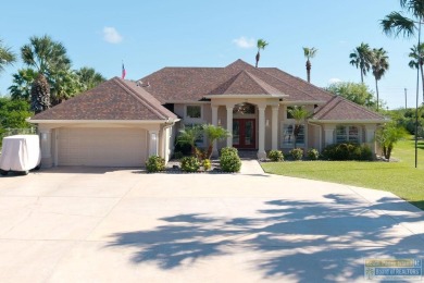Beautiful 4-bedroom, 3.5-bath home on Ocelot Trail in Laguna on South Padre Island Golf Club in Texas - for sale on GolfHomes.com, golf home, golf lot