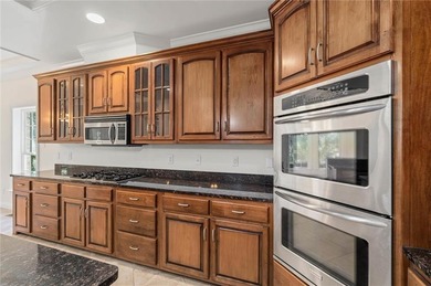 Welcome to 6406 Clear Pointe Ct, located on the Robert Trent on Magnolia Grove Golf Club in Alabama - for sale on GolfHomes.com, golf home, golf lot