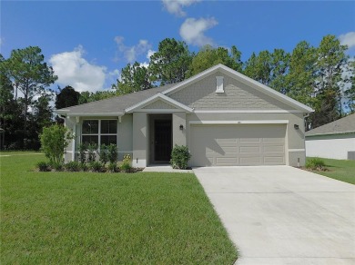 JUST LIKE NEW.. BUT BETTER! This barely lived in Aria model home on Lake Diamond Golf and Country Club in Florida - for sale on GolfHomes.com, golf home, golf lot
