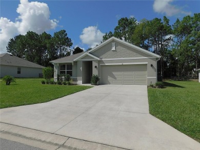 JUST LIKE NEW.. BUT BETTER! This barely lived in Aria model home on Lake Diamond Golf and Country Club in Florida - for sale on GolfHomes.com, golf home, golf lot