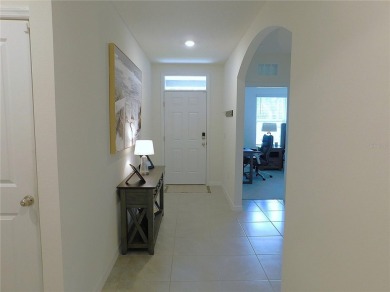 JUST LIKE NEW.. BUT BETTER! This barely lived in Aria model home on Lake Diamond Golf and Country Club in Florida - for sale on GolfHomes.com, golf home, golf lot
