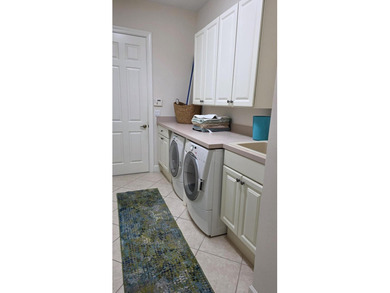 Wonderful opportunity to live in Spyglass of PGA Village. This on PGA Golf Club in PGA Village in Florida - for sale on GolfHomes.com, golf home, golf lot