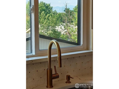 LOCATION, VIEWS and UPDATED FINISHES, this home has it all! on Sunset Golf Course in Colorado - for sale on GolfHomes.com, golf home, golf lot
