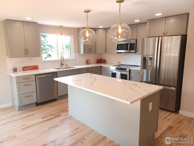 LOCATION, VIEWS and UPDATED FINISHES, this home has it all! on Sunset Golf Course in Colorado - for sale on GolfHomes.com, golf home, golf lot