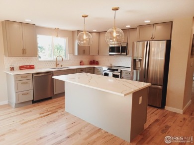 LOCATION, VIEWS and UPDATED FINISHES, this home has it all! on Sunset Golf Course in Colorado - for sale on GolfHomes.com, golf home, golf lot