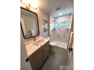LOCATION, VIEWS and UPDATED FINISHES, this home has it all! on Sunset Golf Course in Colorado - for sale on GolfHomes.com, golf home, golf lot