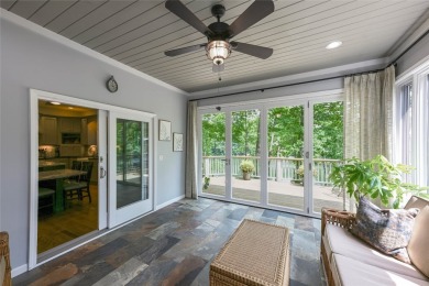 Experience serene lakefront living in this exceptional retreat on Burlingame Country Club in North Carolina - for sale on GolfHomes.com, golf home, golf lot
