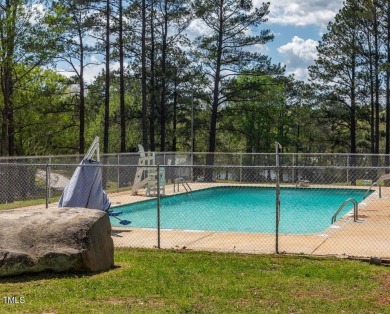 Welcome to your home. Discover this comfortable and cozy Ranch on River Golf and County Club at Lake Royale in North Carolina - for sale on GolfHomes.com, golf home, golf lot