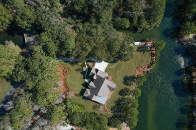 This stunning one-story home, built by Steve Koenig and designed on The Golf Club At Briars Creek in South Carolina - for sale on GolfHomes.com, golf home, golf lot
