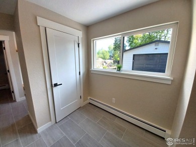 LOCATION, VIEWS and UPDATED FINISHES, this home has it all! on Sunset Golf Course in Colorado - for sale on GolfHomes.com, golf home, golf lot