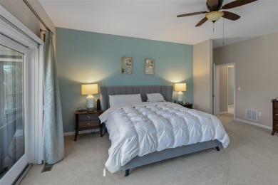 Experience serene lakefront living in this exceptional retreat on Burlingame Country Club in North Carolina - for sale on GolfHomes.com, golf home, golf lot