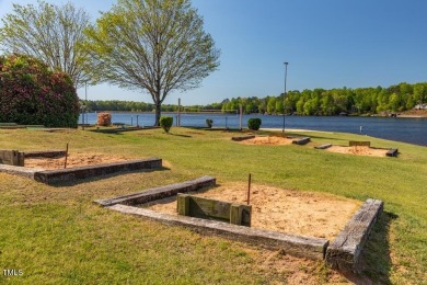 Welcome to your home. Discover this comfortable and cozy Ranch on River Golf and County Club at Lake Royale in North Carolina - for sale on GolfHomes.com, golf home, golf lot