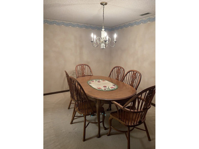 Come home to your quiet place in Oak Hills Country Club Village on Oak Hills Country Club in Illinois - for sale on GolfHomes.com, golf home, golf lot