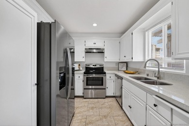 Ground-level ease, elevated living. Perfectly positioned as a on Lake San Marcos Country Club- South Course in California - for sale on GolfHomes.com, golf home, golf lot