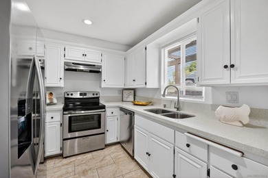 Ground-level ease, elevated living. Perfectly positioned as a on Lake San Marcos Country Club- South Course in California - for sale on GolfHomes.com, golf home, golf lot