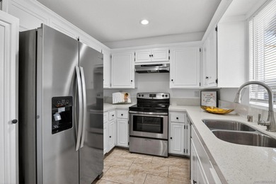 Ground-level ease, elevated living. Perfectly positioned as a on Lake San Marcos Country Club- South Course in California - for sale on GolfHomes.com, golf home, golf lot