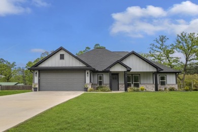 This beautifully custom-built home offers an inviting on Rayburn Country Club in Texas - for sale on GolfHomes.com, golf home, golf lot