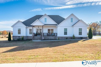 This beautiful home situated on a corner lot offers 3 bedrooms on Goose Pond Colony Resort - Plantation Golf Course in Alabama - for sale on GolfHomes.com, golf home, golf lot
