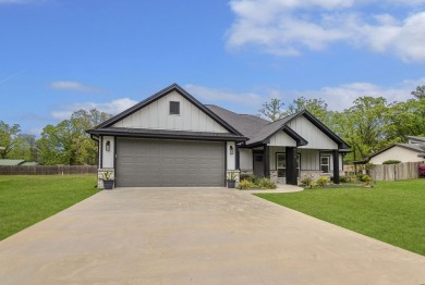 This beautifully custom-built home offers an inviting on Rayburn Country Club in Texas - for sale on GolfHomes.com, golf home, golf lot