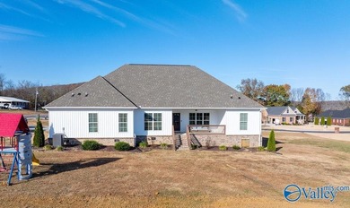 This beautiful home situated on a corner lot offers 3 bedrooms on Goose Pond Colony Resort - Plantation Golf Course in Alabama - for sale on GolfHomes.com, golf home, golf lot