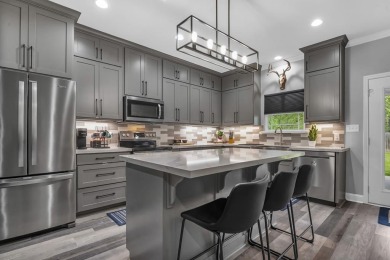 This beautifully custom-built home offers an inviting on Rayburn Country Club in Texas - for sale on GolfHomes.com, golf home, golf lot