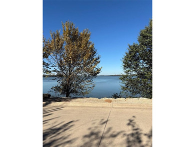 This Lot is located in the exclusive private and secure with on The Golf Club at Resort Eagle Mountain Lake in Texas - for sale on GolfHomes.com, golf home, golf lot