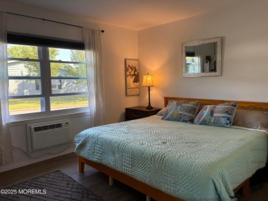 Completely updated ETON model with a highly desirable sun porch on Greenbriar Woodlands in New Jersey - for sale on GolfHomes.com, golf home, golf lot