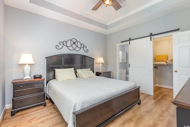 This exquisite top floor end unit is a luxurious retreat with on Barefoot Resort and Golf Club  in South Carolina - for sale on GolfHomes.com, golf home, golf lot