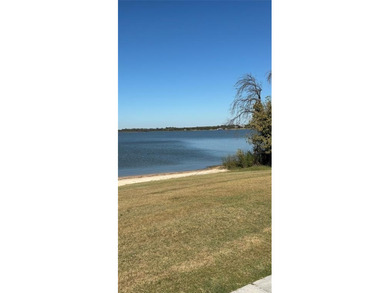 This Lot is located in the exclusive private and secure with on The Golf Club at Resort Eagle Mountain Lake in Texas - for sale on GolfHomes.com, golf home, golf lot