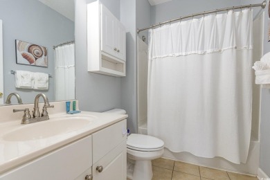 This exquisite top floor end unit is a luxurious retreat with on Barefoot Resort and Golf Club  in South Carolina - for sale on GolfHomes.com, golf home, golf lot