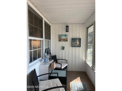 Completely updated ETON model with a highly desirable sun porch on Greenbriar Woodlands in New Jersey - for sale on GolfHomes.com, golf home, golf lot