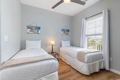 This exquisite top floor end unit is a luxurious retreat with on Barefoot Resort and Golf Club  in South Carolina - for sale on GolfHomes.com, golf home, golf lot