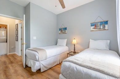 This exquisite top floor end unit is a luxurious retreat with on Barefoot Resort and Golf Club  in South Carolina - for sale on GolfHomes.com, golf home, golf lot