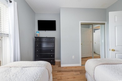 This exquisite top floor end unit is a luxurious retreat with on Barefoot Resort and Golf Club  in South Carolina - for sale on GolfHomes.com, golf home, golf lot