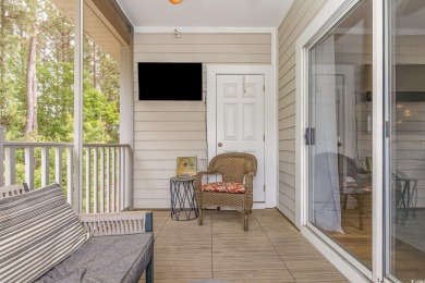 This exquisite top floor end unit is a luxurious retreat with on Barefoot Resort and Golf Club  in South Carolina - for sale on GolfHomes.com, golf home, golf lot